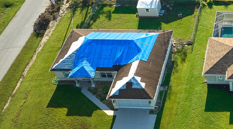 Image showcasing Roof Tarping: How-To, The Process, Longevity, and Safety